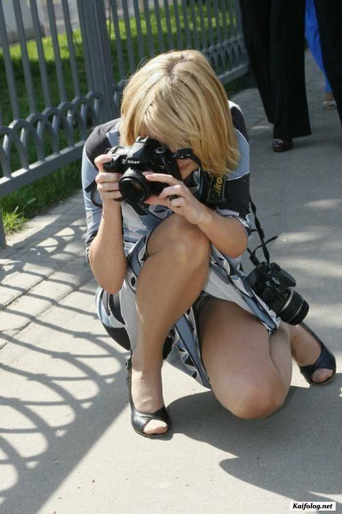 секси девушка с фотоаппаратом